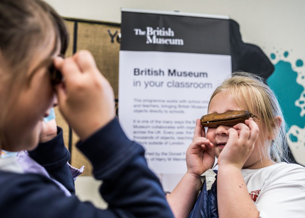 children looking through Innuit goggles