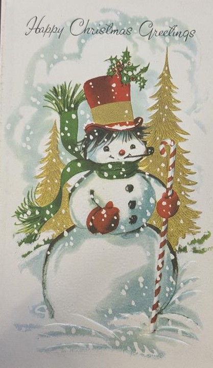 A christmas card from Museum of Hartlepool's collection showing a snowman with a hat, scarf, gloves and pipe. He's holding a red and white stripy candy cane.